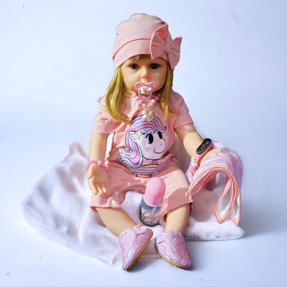 24 inch silicone vinyl doll with deluxe accessories.Realistic.